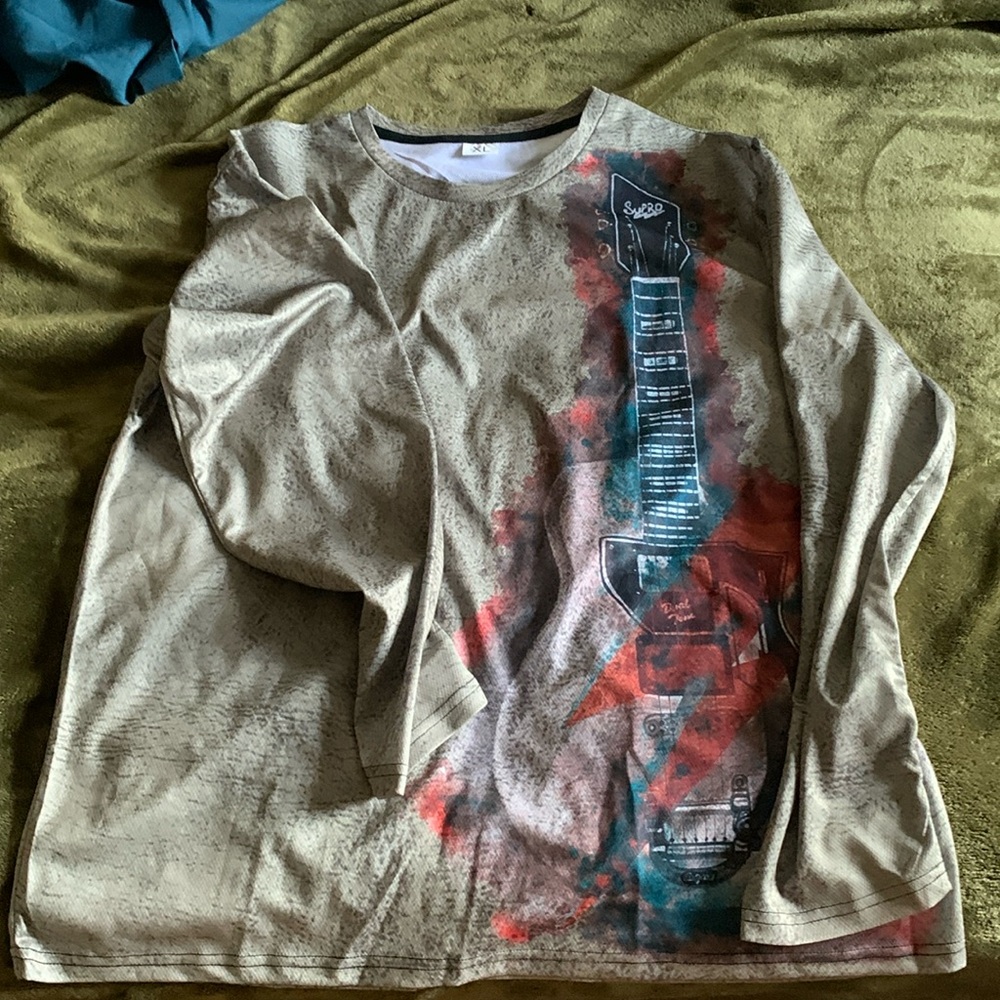 Brand new without tags long sleeve jersey shirt.